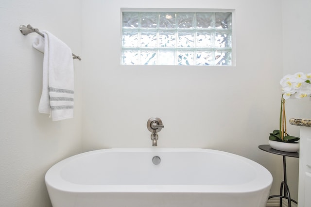 10035 Ella Lee Ln, Houston, TX 77042 - bathroom featuring a freestanding bath and a sink