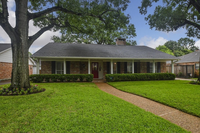 10035 Ella Lee Ln, Houston, TX 77042 - ranch-style house featuring brick siding, a chimney, and a shingled roof