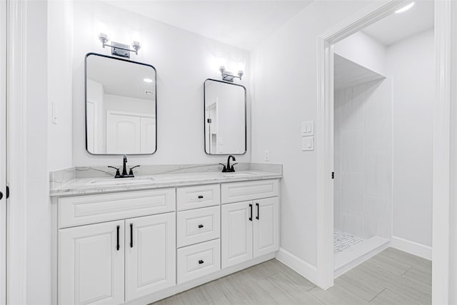 10019 Braes Forest Dr, Houston, TX 77071 - bathroom with double vanity and tiled shower