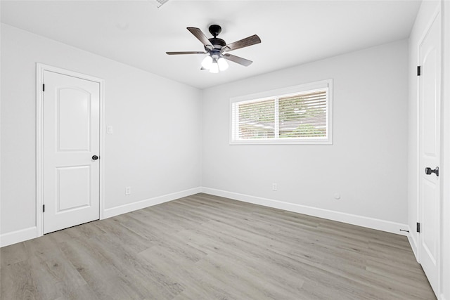 10019 Braes Forest Dr, Houston, TX 77071 - unfurnished bedroom with wood finished floors and ceiling fan