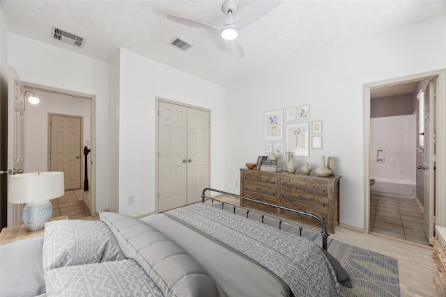3324 Masters Point Dr, Houston, TX 77091 - bedroom with a closet, ceiling fan, and ensuite bathroom