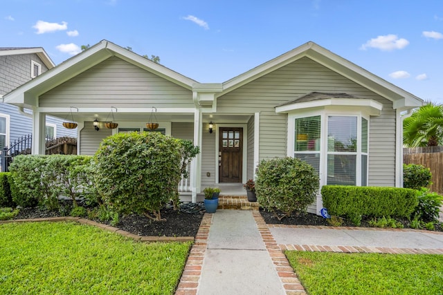 829 E 27th St, Houston, TX 77009 - view of front facade featuring a porch