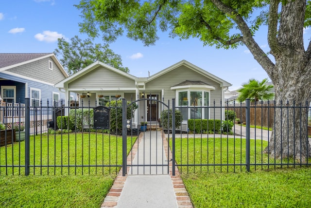 829 E 27th St, Houston, TX 77009 - bungalow with a gate, a fenced front yard, and a porch