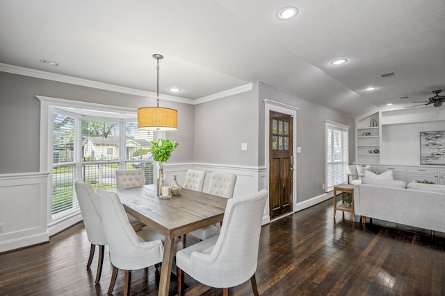 829 E 27th St, Houston, TX 77009 - dining space with built in features, dark wood-type flooring, a ceiling fan, recessed lighting, and crown molding