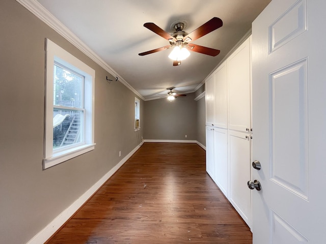 829 E 27th St, Houston, TX 77009 - spare room featuring a ceiling fan, ornamental molding, and dark wood-type flooring