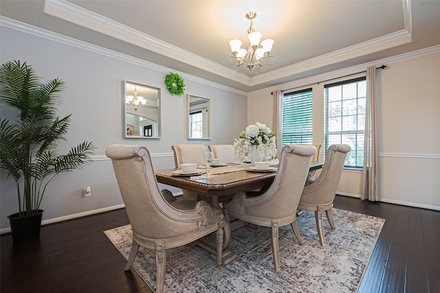 6022 Allendale Ridge Trl, Richmond, TX 77407 - dining room with a chandelier, a raised ceiling, crown molding, and dark wood-type flooring