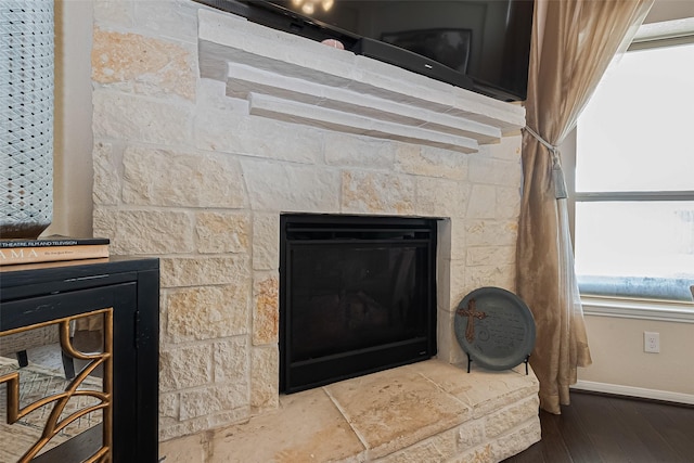 6022 Allendale Ridge Trl, Richmond, TX 77407 - detailed view of wood finished floors and a glass covered fireplace