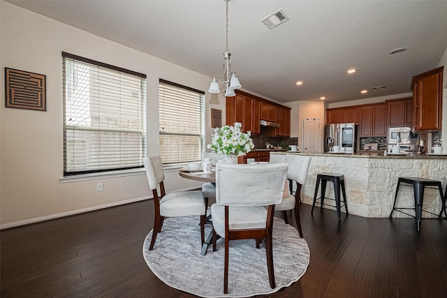 6022 Allendale Ridge Trl, Richmond, TX 77407 - dining space with recessed lighting and dark wood-type flooring