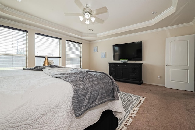 6022 Allendale Ridge Trl, Richmond, TX 77407 - carpeted bedroom with a tray ceiling, ornamental molding, and a ceiling fan