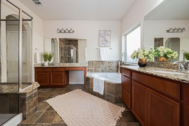 6022 Allendale Ridge Trl, Richmond, TX 77407 - full bathroom with a stall shower, two vanities, and a bath