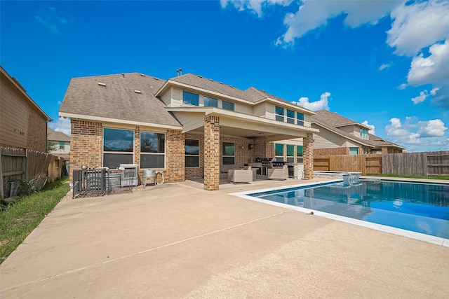 6022 Allendale Ridge Trl, Richmond, TX 77407 - view of pool with an outdoor living space, a patio, a fenced backyard, and a pool with connected hot tub