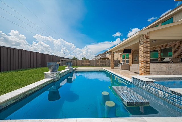 6022 Allendale Ridge Trl, Richmond, TX 77407 - view of swimming pool featuring a fenced backyard, area for grilling, a patio area, and a pool with connected hot tub
