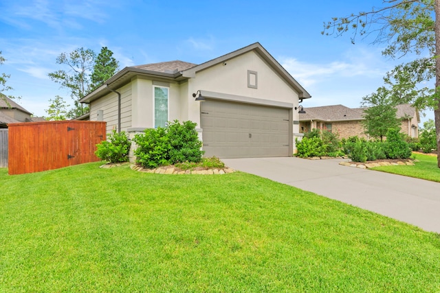 247 N Wild Petunia Trl, Montgomery, TX 77316 - view of front of house with stucco siding, driveway, a garage, and a shingled roof