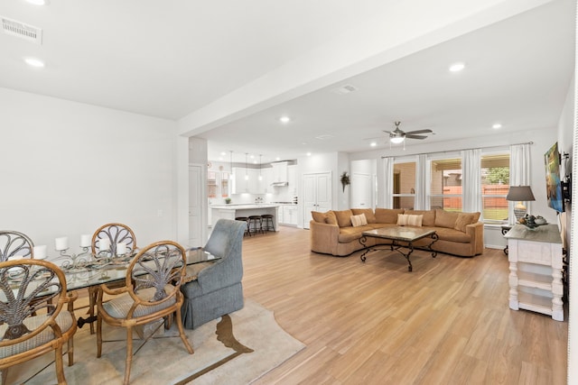 247 N Wild Petunia Trl, Montgomery, TX 77316 - living area featuring light wood-style flooring, a ceiling fan, and recessed lighting