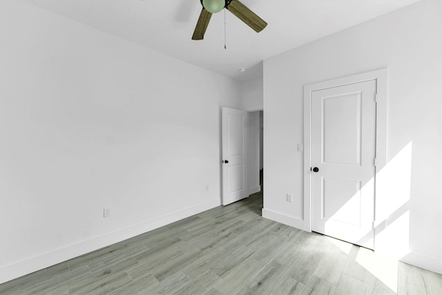 1005 Lake View Dr, Montgomery, TX 77356 - unfurnished bedroom with light wood-style flooring and ceiling fan