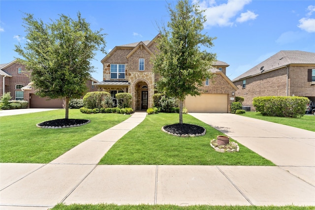 3614 Bonnie Bend Ln, Katy, TX 77494 - traditional-style home with driveway, a front lawn, stone siding, and brick siding