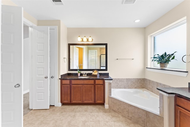 3614 Bonnie Bend Ln, Katy, TX 77494 - bathroom featuring vanity and a garden tub