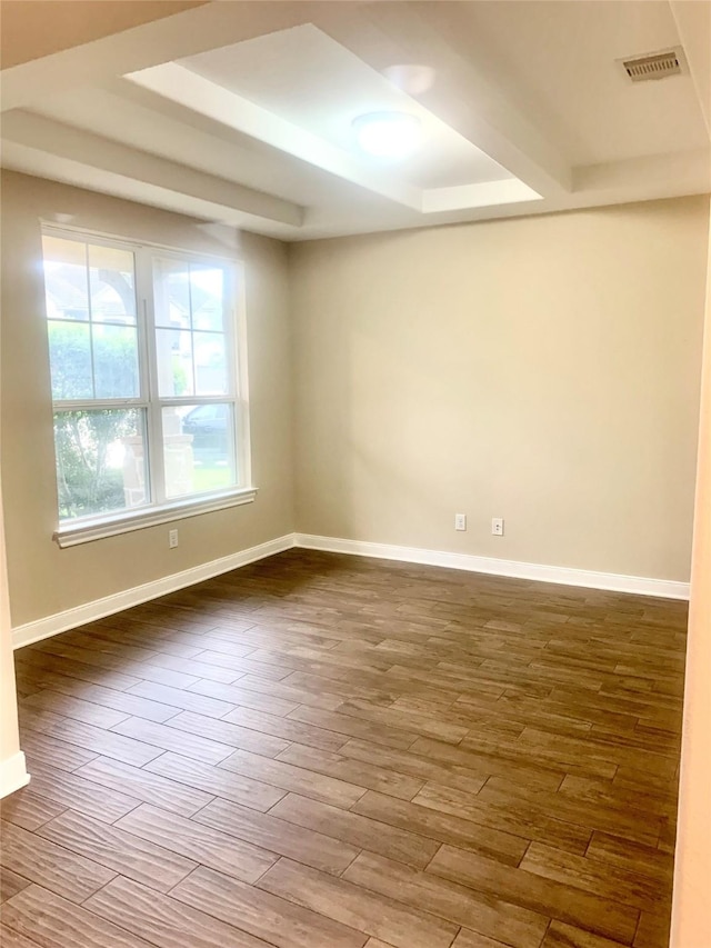 3614 Bonnie Bend Ln, Katy, TX 77494 - spare room with wood finished floors and a raised ceiling