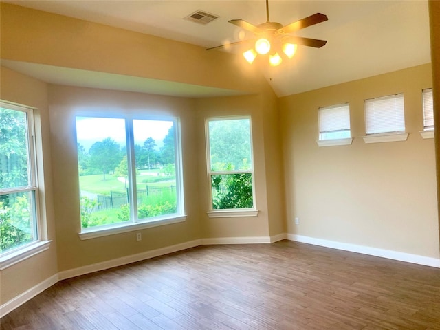 3614 Bonnie Bend Ln, Katy, TX 77494 - spare room with ceiling fan, wood finished floors, and lofted ceiling