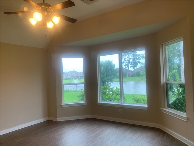 3614 Bonnie Bend Ln, Katy, TX 77494 - spare room with healthy amount of natural light, a ceiling fan, and wood finished floors