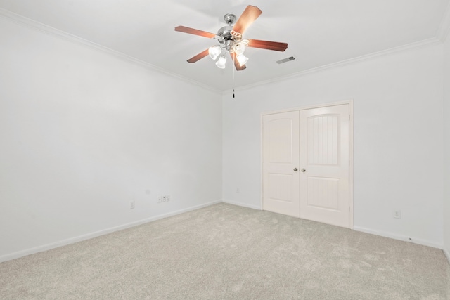 1109 Jacobs Lake Blvd, Conroe, TX 77384 - unfurnished bedroom featuring ornamental molding, carpet flooring, a closet, and a ceiling fan