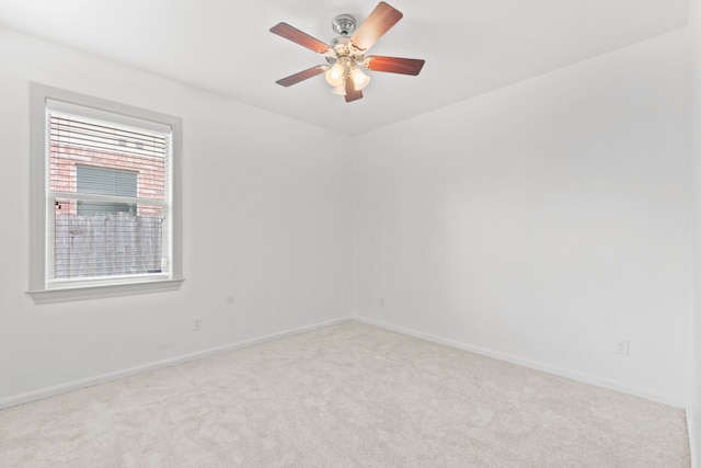 1109 Jacobs Lake Blvd, Conroe, TX 77384 - carpeted spare room featuring baseboards and a ceiling fan