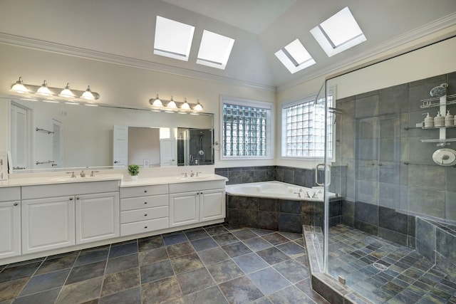 5346 Mcculloch Cir, Houston, TX 77056 - full bathroom with a skylight, double vanity, a stall shower, a garden tub, and crown molding