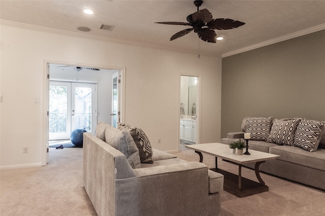 5346 Mcculloch Cir, Houston, TX 77056 - living room with light carpet, ornamental molding, ceiling fan, and recessed lighting