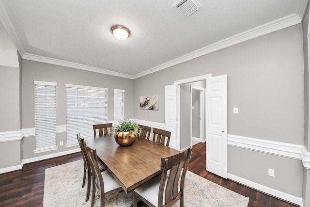 8618 Aldeburgh Ct, Spring, TX 77379 - dining area with crown molding and wood finished floors