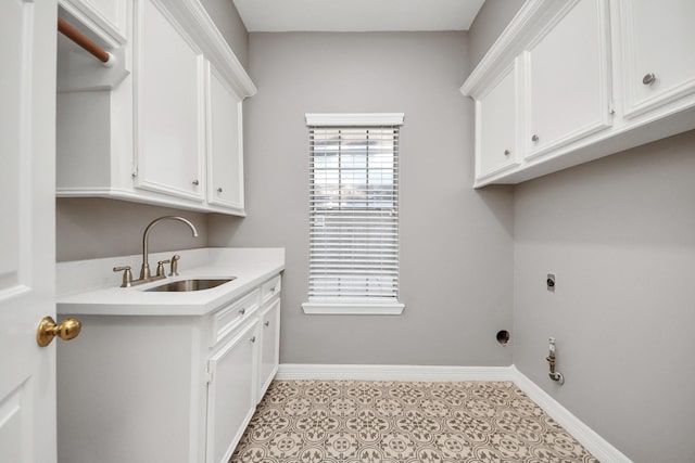 8618 Aldeburgh Ct, Spring, TX 77379 - washroom featuring cabinet space and electric dryer hookup