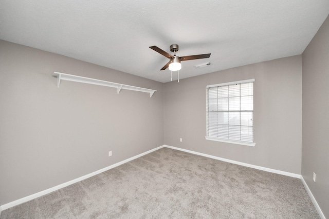 8618 Aldeburgh Ct, Spring, TX 77379 - unfurnished room featuring a ceiling fan and carpet floors