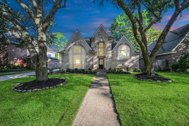 8618 Aldeburgh Ct, Spring, TX 77379 - french country home featuring brick siding