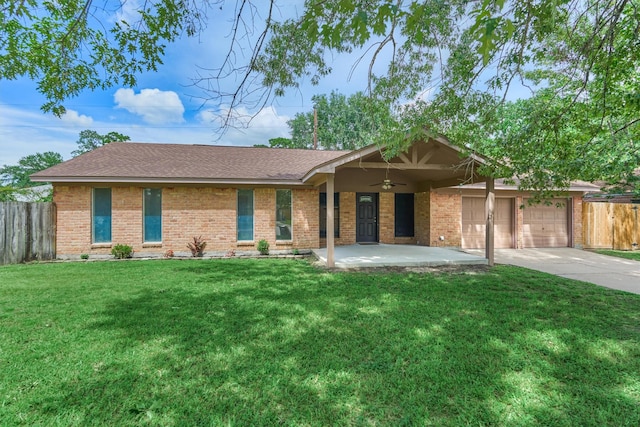 29318 Waltham St, Spring, TX 77386 - ranch-style house with a ceiling fan, driveway, an attached garage, brick siding, and roof with shingles