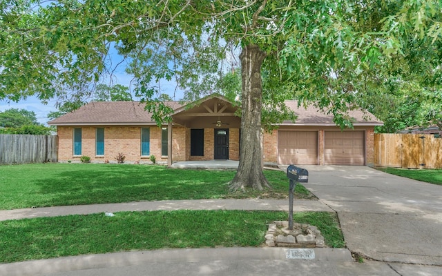 29318 Waltham St, Spring, TX 77386 - ranch-style house featuring brick siding, driveway, an attached garage, and a porch