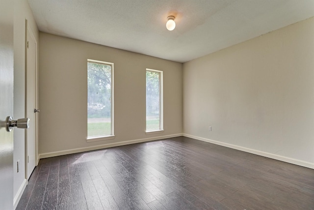 29318 Waltham St, Spring, TX 77386 - spare room with healthy amount of natural light and dark wood-type flooring