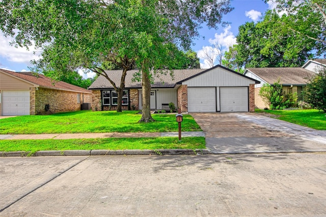 13403 Splintered Oak Dr, Houston, TX 77065 - mid-century inspired home with a garage, a front lawn, concrete driveway, brick siding, and a shingled roof