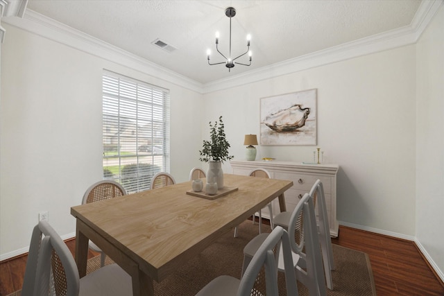 18518 Autumn Park Dr, Houston, TX 77084 - dining space with dark wood-style flooring, a chandelier, and ornamental molding