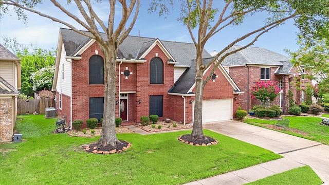 18518 Autumn Park Dr, Houston, TX 77084 - traditional home with brick siding, concrete driveway, and roof with shingles