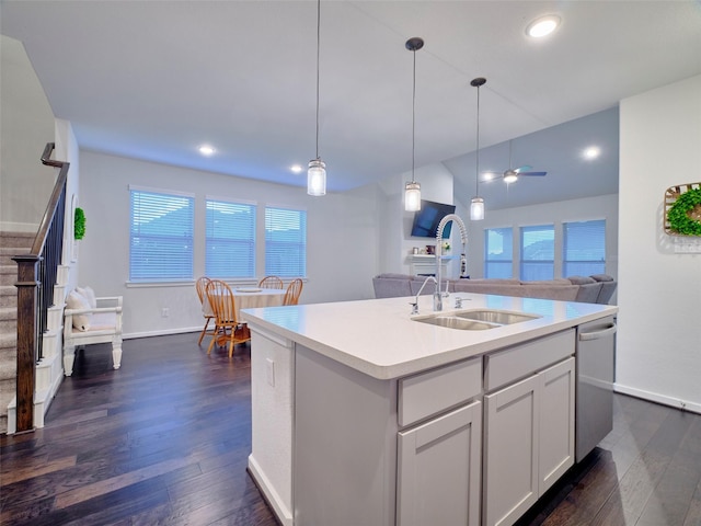 400 Beken Cove Ln, La Porte, TX 77571 - kitchen featuring dark wood finished floors, light countertops, healthy amount of natural light, open floor plan, and recessed lighting
