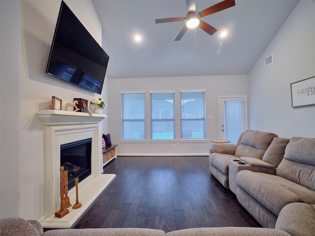 400 Beken Cove Ln, La Porte, TX 77571 - living area with a glass covered fireplace, ceiling fan, wood finished floors, recessed lighting, and high vaulted ceiling