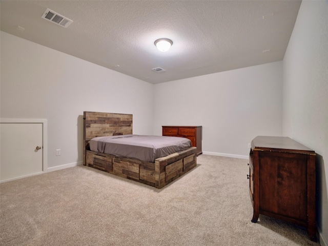 400 Beken Cove Ln, La Porte, TX 77571 - carpeted bedroom with a textured ceiling and baseboards