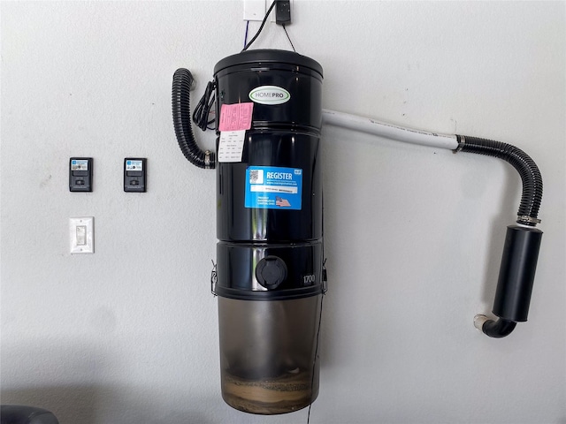10011 Serenity Grove Dr, Missouri City, TX 77459 - detailed view of a central vacuum unit