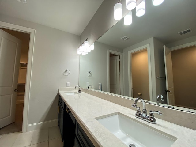10011 Serenity Grove Dr, Missouri City, TX 77459 - full bath with tile patterned floors, double vanity, and a walk in closet