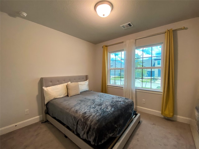 10011 Serenity Grove Dr, Missouri City, TX 77459 - bedroom featuring baseboards and light colored carpet