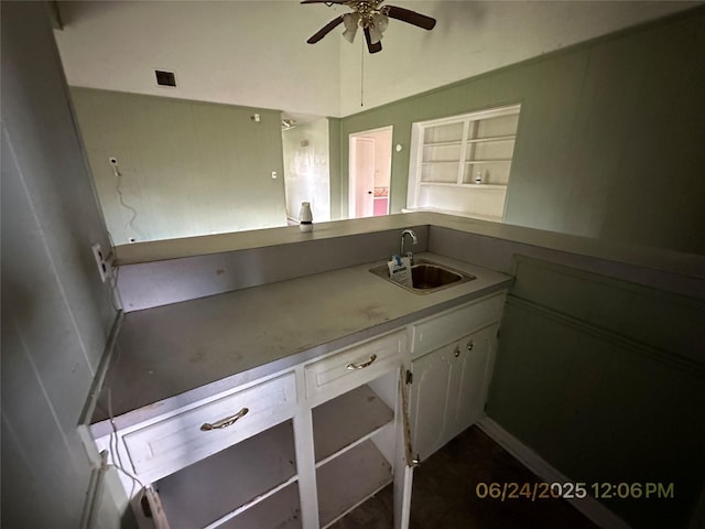 288 Twin Lakes Blvd W, West Columbia, TX 77486 - kitchen featuring a ceiling fan, white cabinetry, and vaulted ceiling