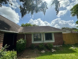 288 Twin Lakes Blvd W, West Columbia, TX 77486 - view of home's exterior featuring brick siding