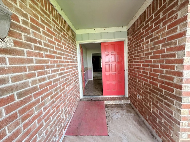 288 Twin Lakes Blvd W, West Columbia, TX 77486 - doorway to property featuring brick siding