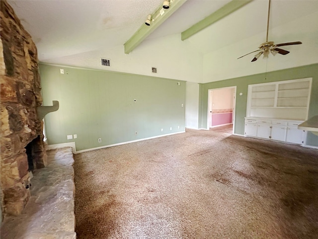 288 Twin Lakes Blvd W, West Columbia, TX 77486 - unfurnished living room with a ceiling fan, carpet floors, beam ceiling, high vaulted ceiling, and a fireplace
