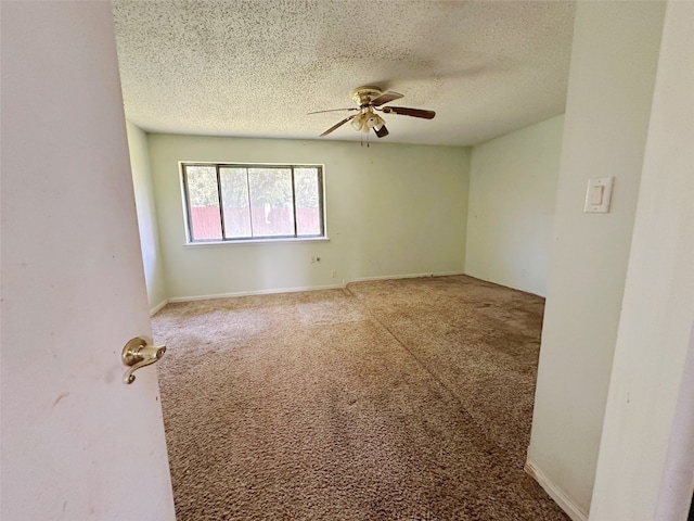 288 Twin Lakes Blvd W, West Columbia, TX 77486 - spare room featuring a ceiling fan, carpet floors, and a textured ceiling