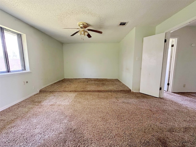 288 Twin Lakes Blvd W, West Columbia, TX 77486 - carpeted spare room with ceiling fan and a textured ceiling